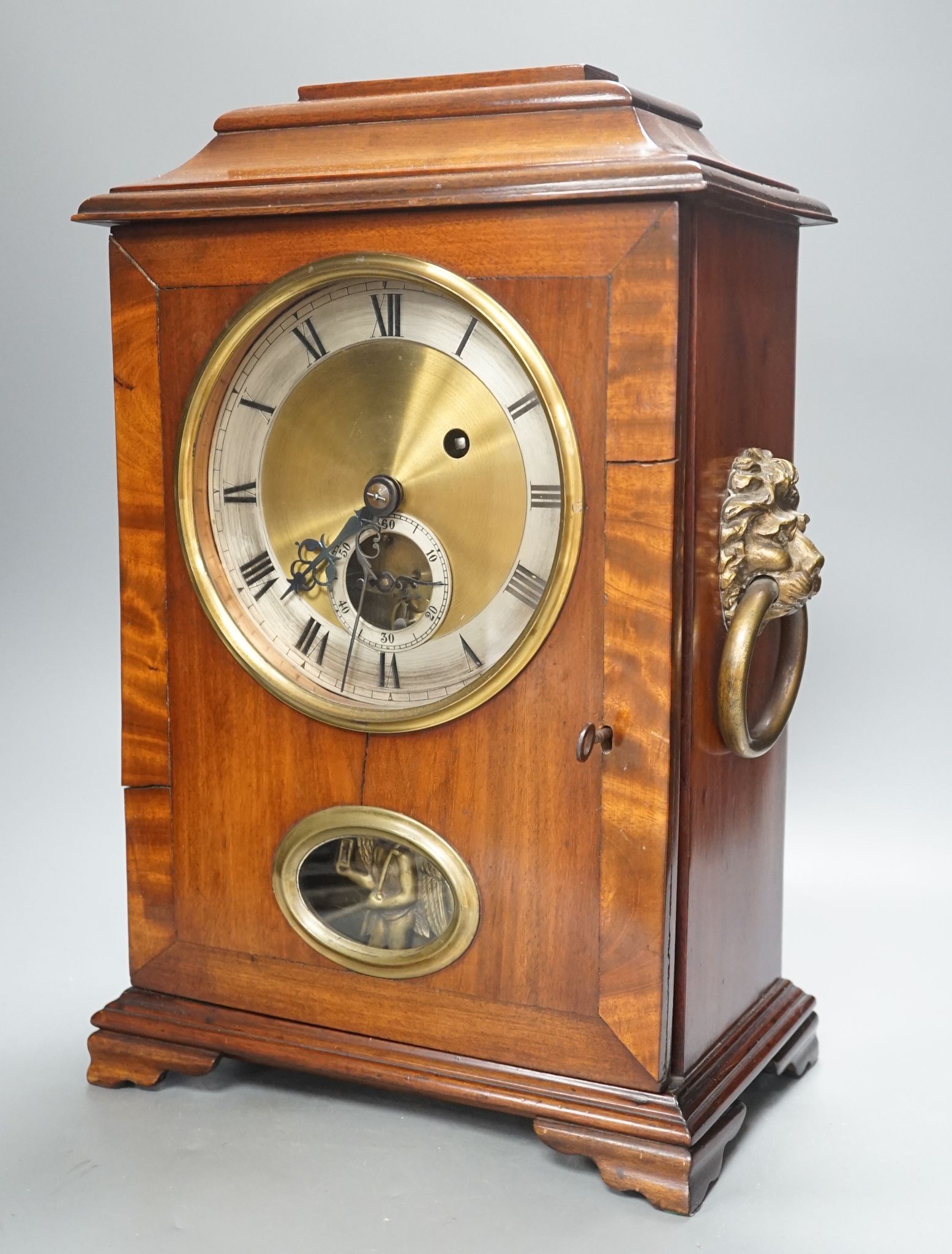 A mahogany and brass mounted bracket timepiece, 42cm, with adapted single fusee movement and visible wheel escapement